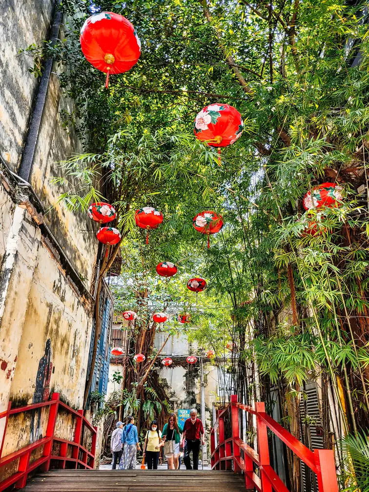 A vibrant alleyway at Kwai Chai Hong decorated with red lanterns, Kuala Lumpur.